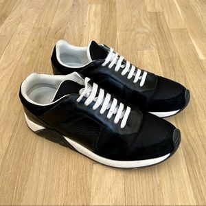 DIOR black sneakers.